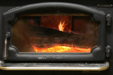 Fire crackling in my sister's wood stove